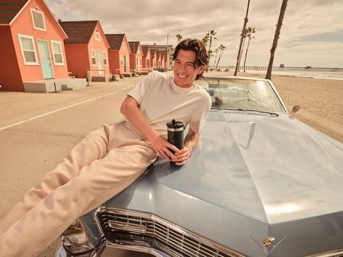 imageSTANLEY IceFlow 20 Flip Straw Tumbler with Handle 30 oz Twist On Lid and Flip Up Straw Leak Resistant Water Bottle Insulated Stainless Steel BPAFree HydrangeaBlack 20