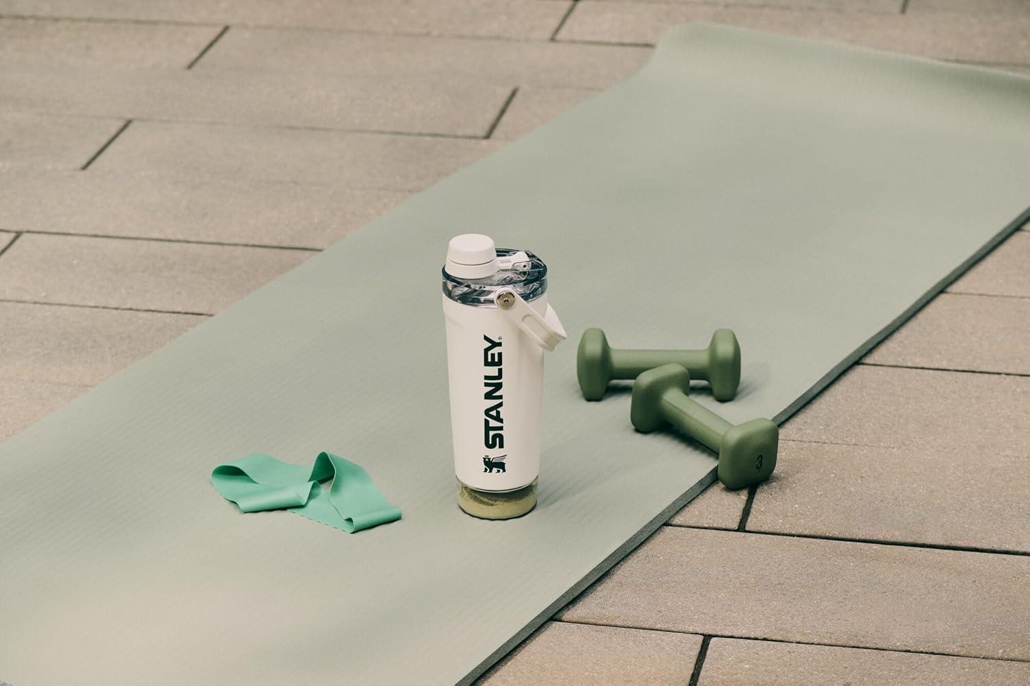 imageStanley Activate Shaker Bottle 20 oz Leakproof Insulated Stainless Steel Shaker Cup Base Storage and Twist On Fast Flow Lid Protein Shakes and Pre Workout Powder BPAFree TwilightSage Grey