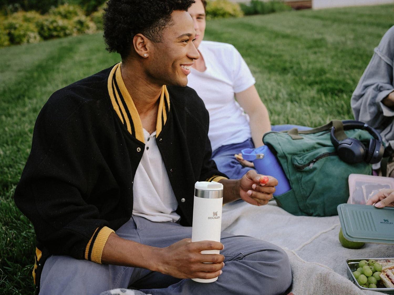 imageStanley AeroLight Transit Bottle 20 oz Locking Drink Through Lid Leak Resistant Water Bottle or Coffee Travel Mug Lightweight Insulated Stainless Steel BPAFree Rose QuartzCream