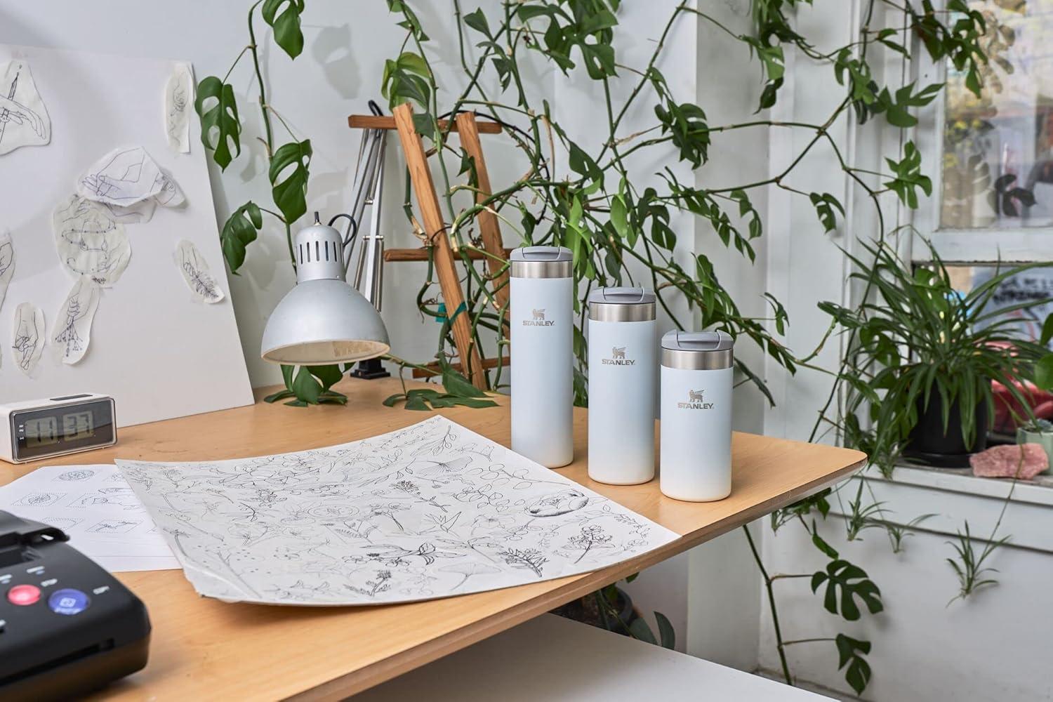 imageStanley AeroLight Transit Bottle 20 oz Locking Drink Through Lid Leak Resistant Water Bottle or Coffee Travel Mug Lightweight Insulated Stainless Steel BPAFree Rose QuartzCloud