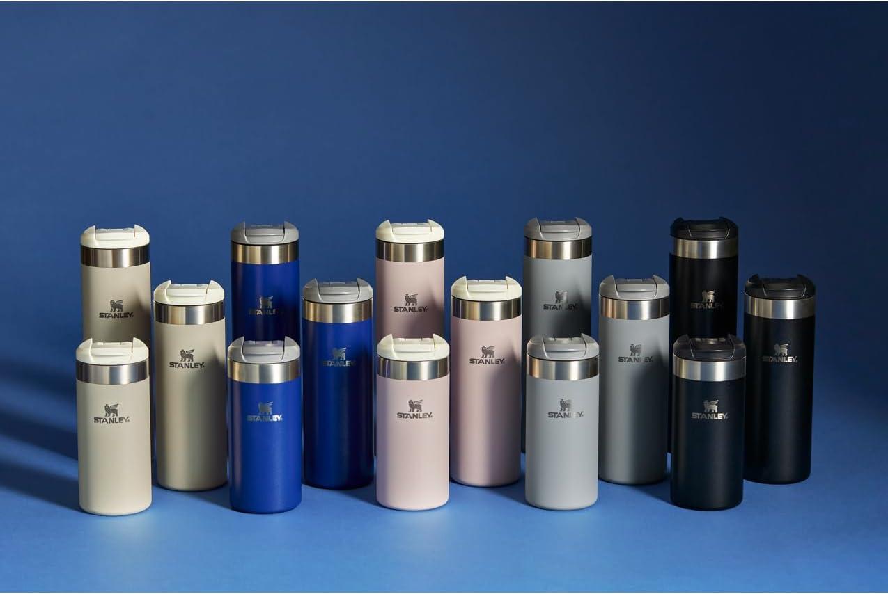 imageStanley AeroLight Transit Bottle 20 oz Locking Drink Through Lid Leak Resistant Water Bottle or Coffee Travel Mug Lightweight Insulated Stainless Steel BPAFree Rose QuartzShale