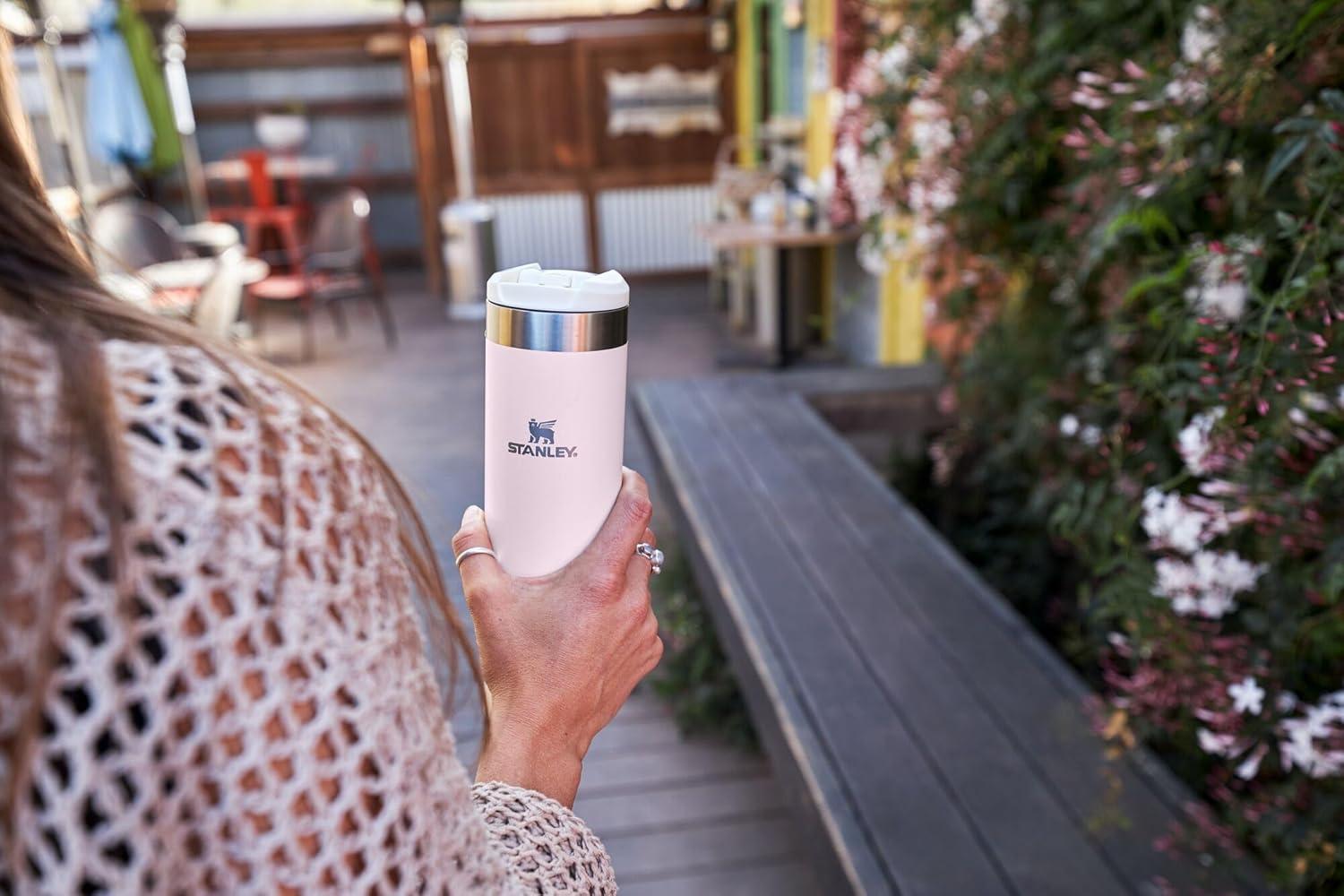 imageStanley AeroLight Transit Bottle 20 oz Locking Drink Through Lid Leak Resistant Water Bottle or Coffee Travel Mug Lightweight Insulated Stainless Steel BPAFree Rose QuartzCream