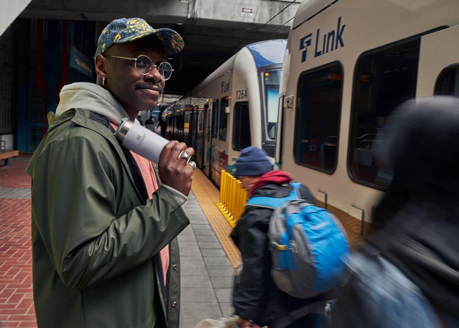 imageStanley AeroLight Transit Bottle 20 oz Locking Drink Through Lid Leak Resistant Water Bottle or Coffee Travel Mug Lightweight Insulated Stainless Steel BPAFree Rose QuartzCloud