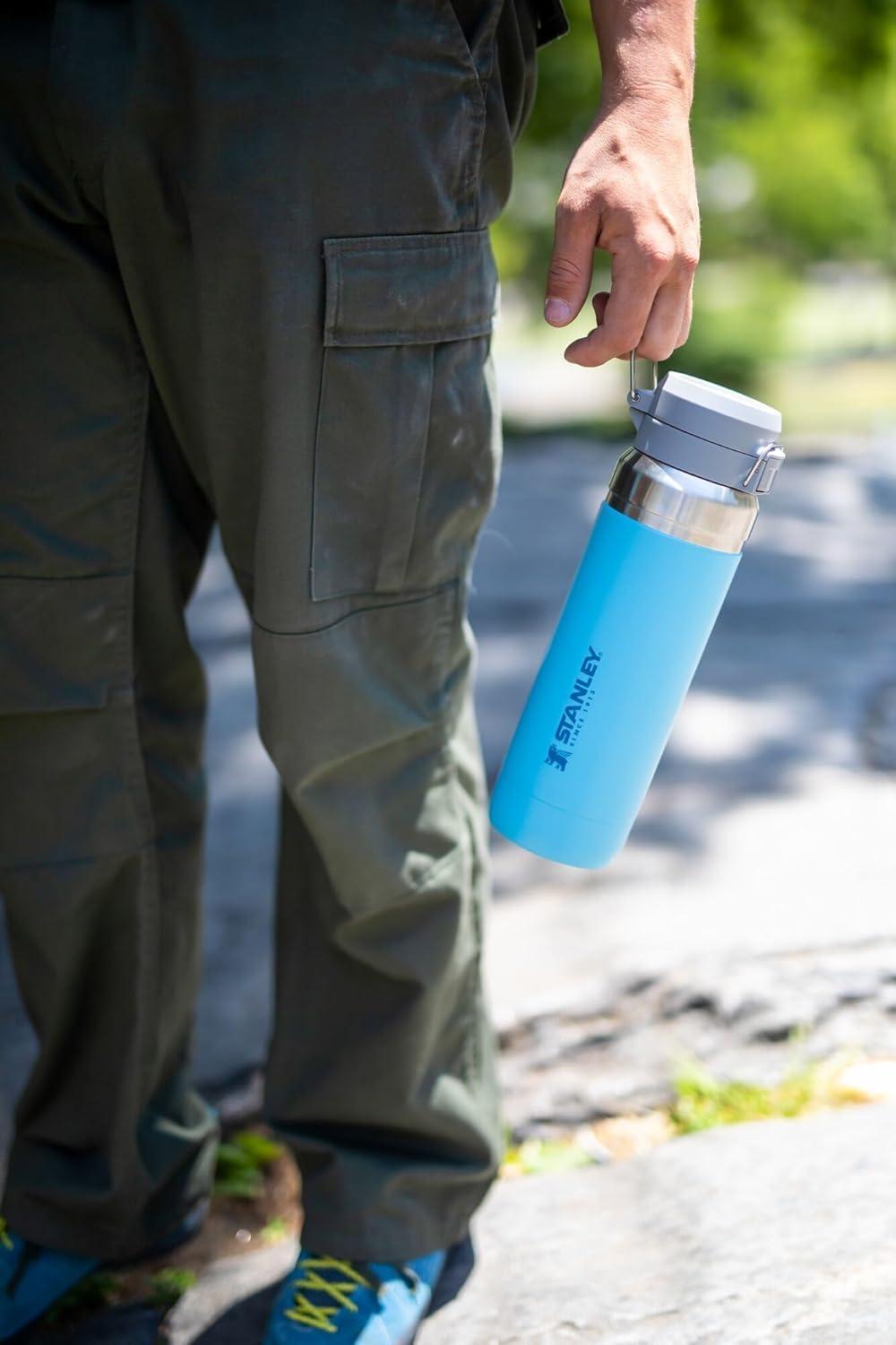 imageStanley Quick Flip GO Water Bottle 24 oz Push Button Lid Leakproof and Packable for Travel and Sports Insulated Stainless Steel BPAFree AzureAzure