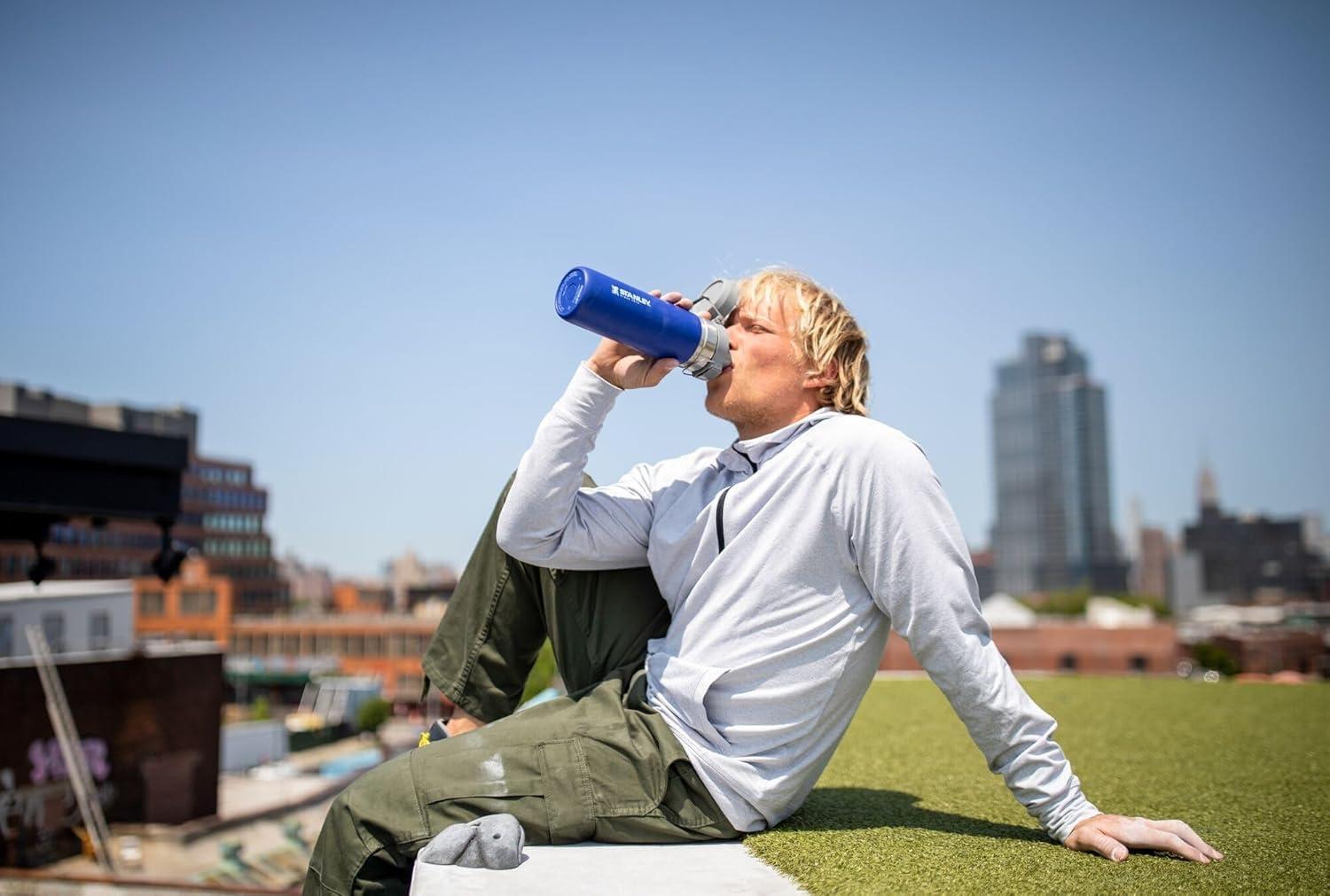 imageStanley Quick Flip GO Water Bottle 24 oz Push Button Lid Leakproof and Packable for Travel and Sports Insulated Stainless Steel BPAFree AzureBlack 20