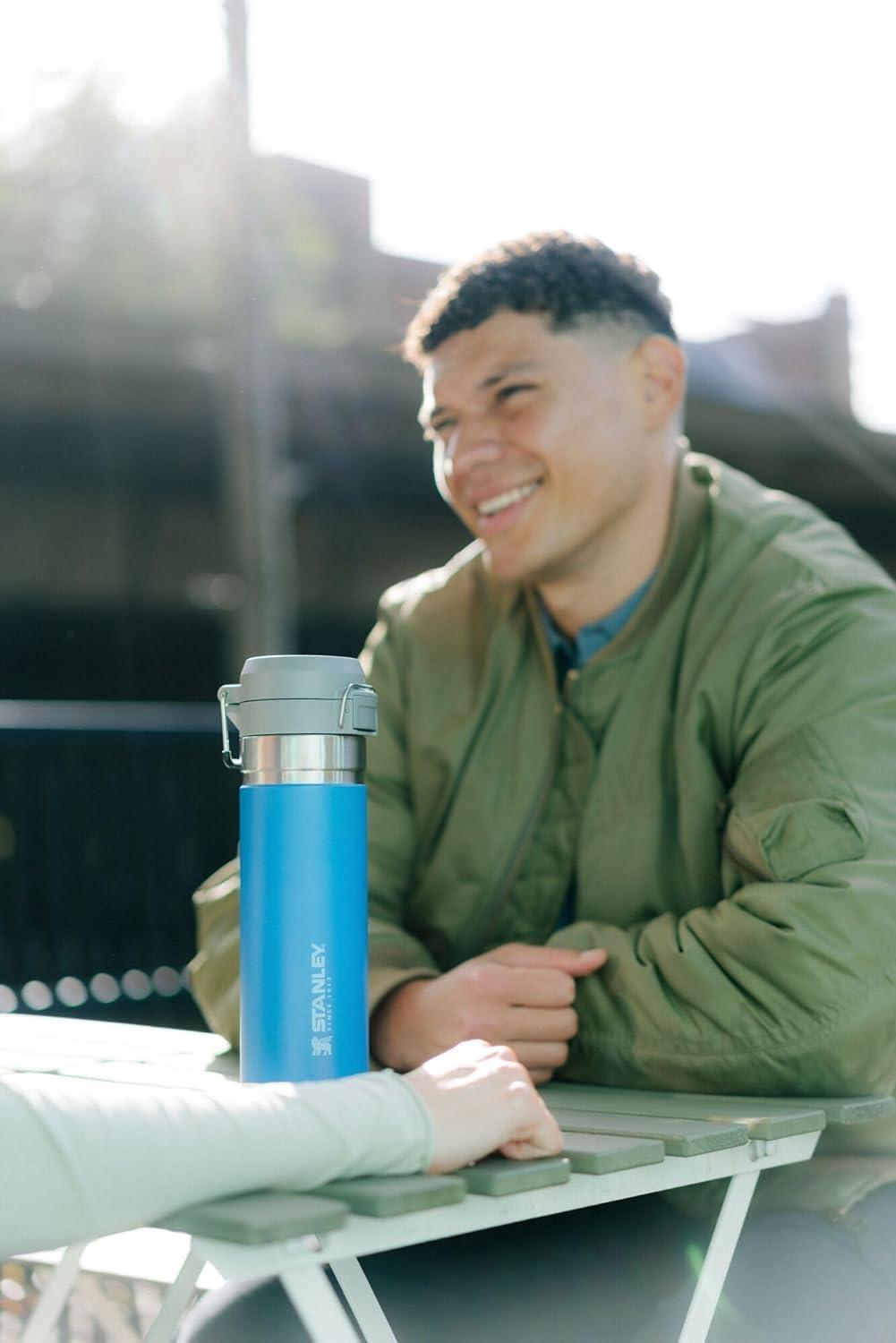 imageStanley Quick Flip GO Water Bottle 24 oz Push Button Lid Leakproof and Packable for Travel and Sports Insulated Stainless Steel BPAFree AzurePomelo