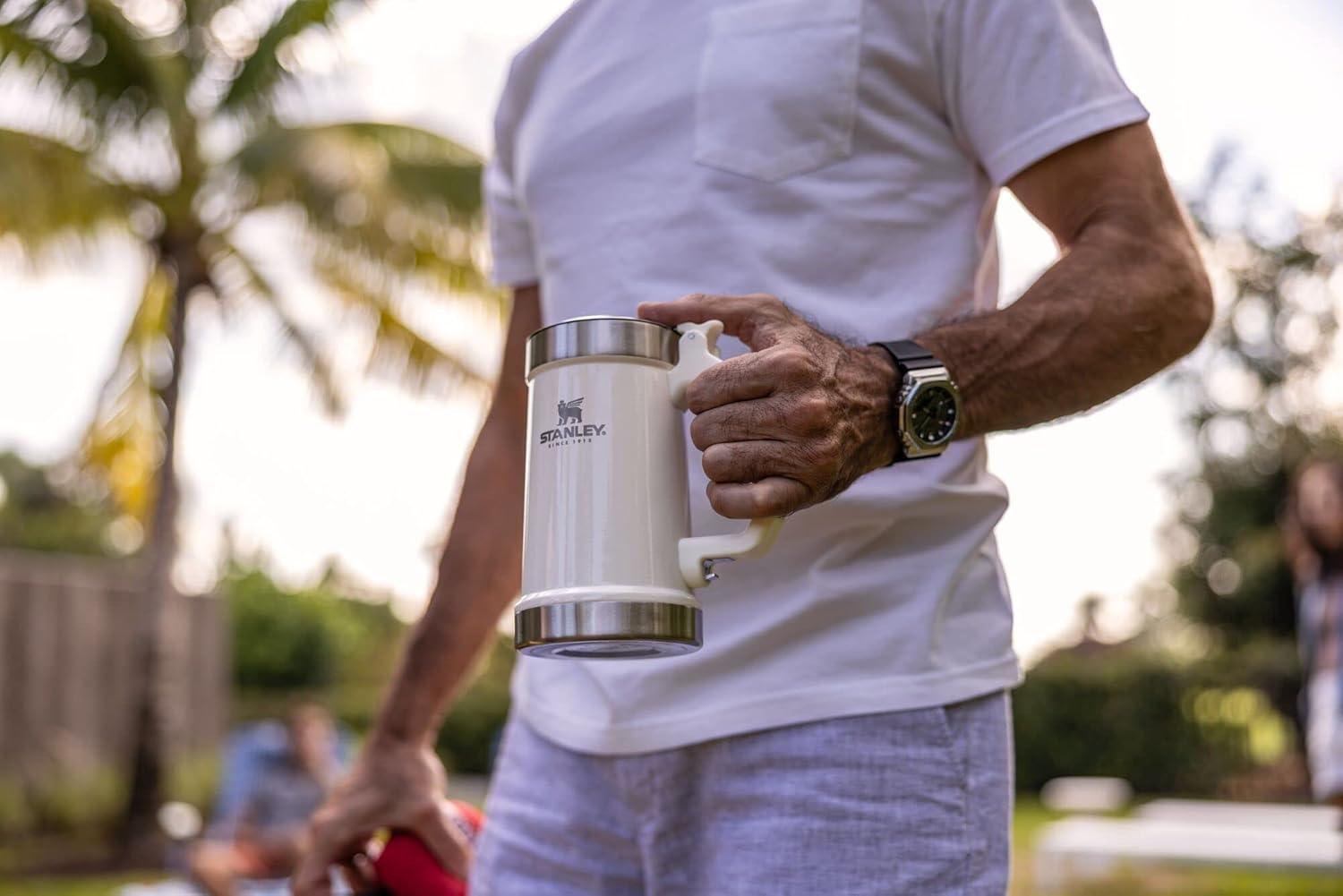 imageSTANLEY Classic Bottle Opener Beer Stein 24 oz Flip Up Lid and Heavy Duty Handle with Built In Bottle Opener Insulated Stainless Steel Beer Mug BPAFree Black 20