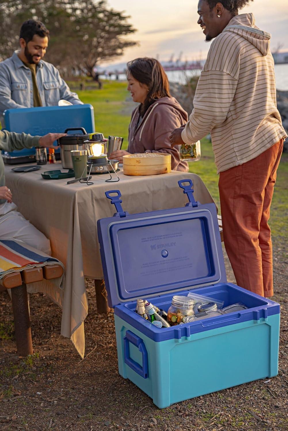 imageStanley Adventure Outdoor Cooler 50 qt Heavy Duty Outdoor Camping Cooler with Easy Carry Side Handles 6 Days Cooling Ice Chest for 82 Cans Flat Top Doubles as Seat BPAFree Tigerlily PlumBlack 20
