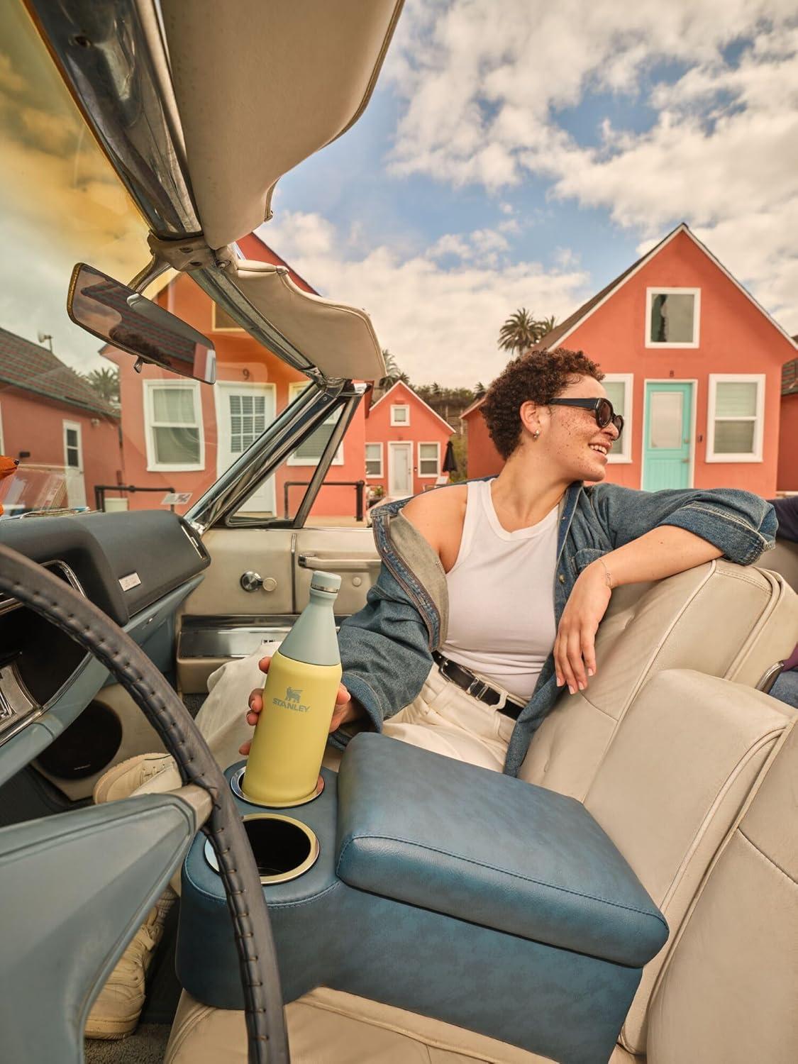 imageStanley All Day Slim Bottle 34 oz Twist off Lid with Leakproof Seal Slim Design for Travel and Gym Insulated Stainless Steel Water Bottle BPAFree Twilight Gloss