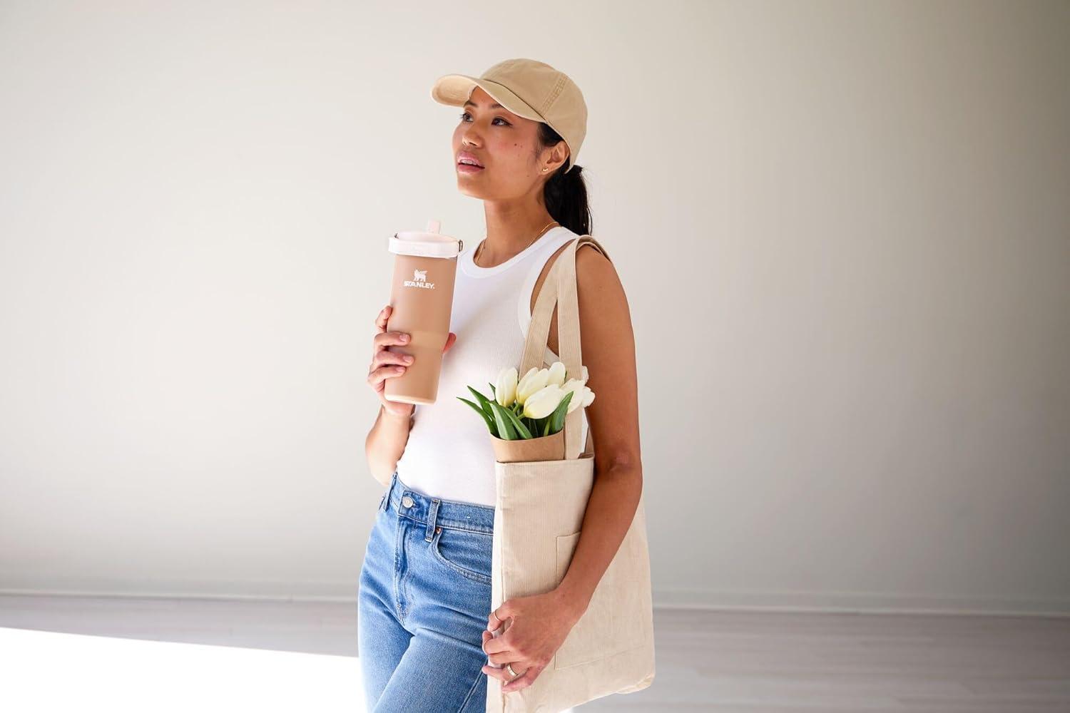 imageStanley IceFlow Flip Straw Tumbler with Handle 20 oz Twist On Lid and Flip Up Straw Leak Resistant Water Bottle Insulated Stainless Steel BPAFree PlumAlmond Rose