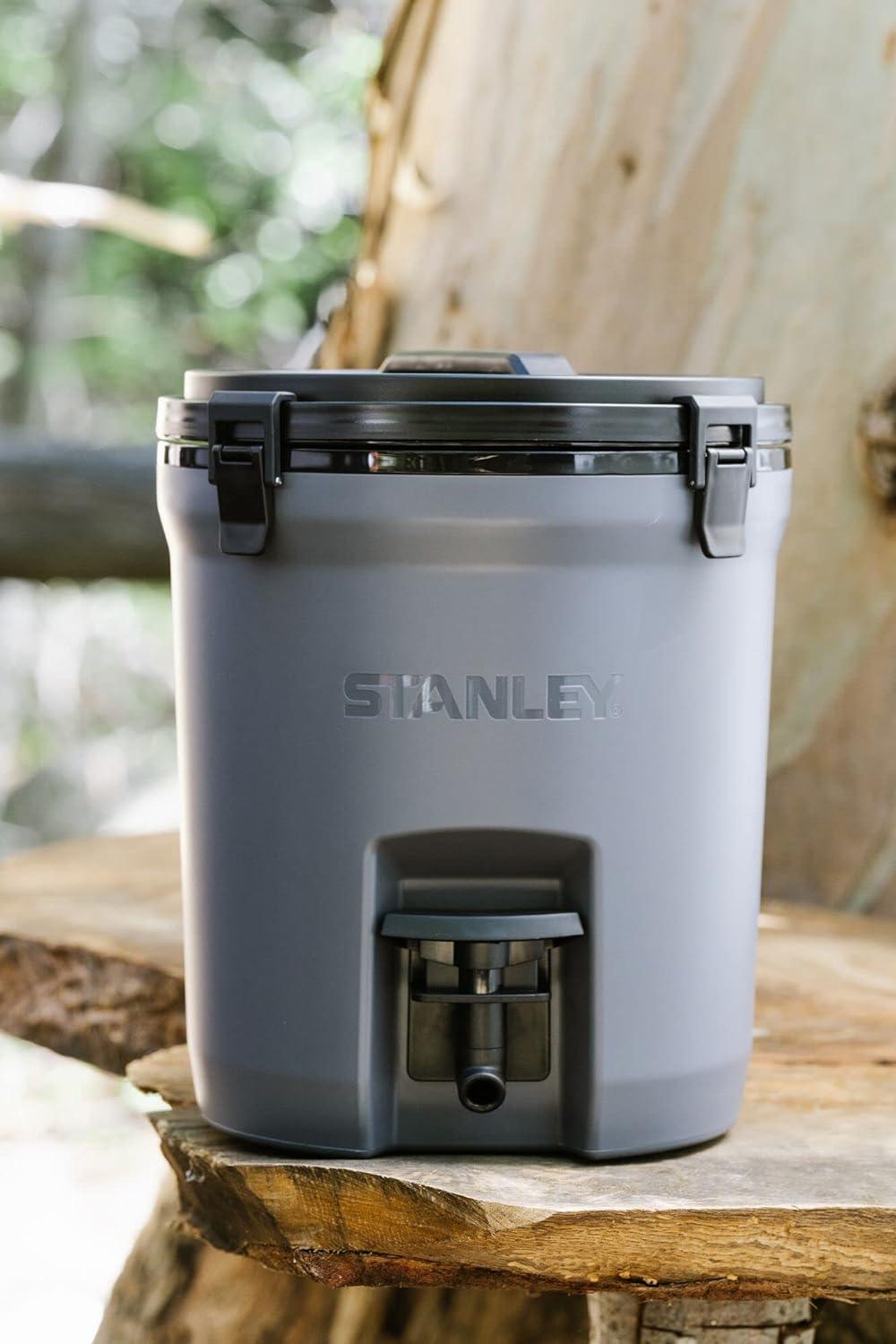 imageStanley Adventure Fast Flow Water Jug 2 Gallon Leakproof Ice Water Dispenser Insulated Beverage Cooler Easy Pour Spigot and Latched Foam Lid BPAFreeCharcoal