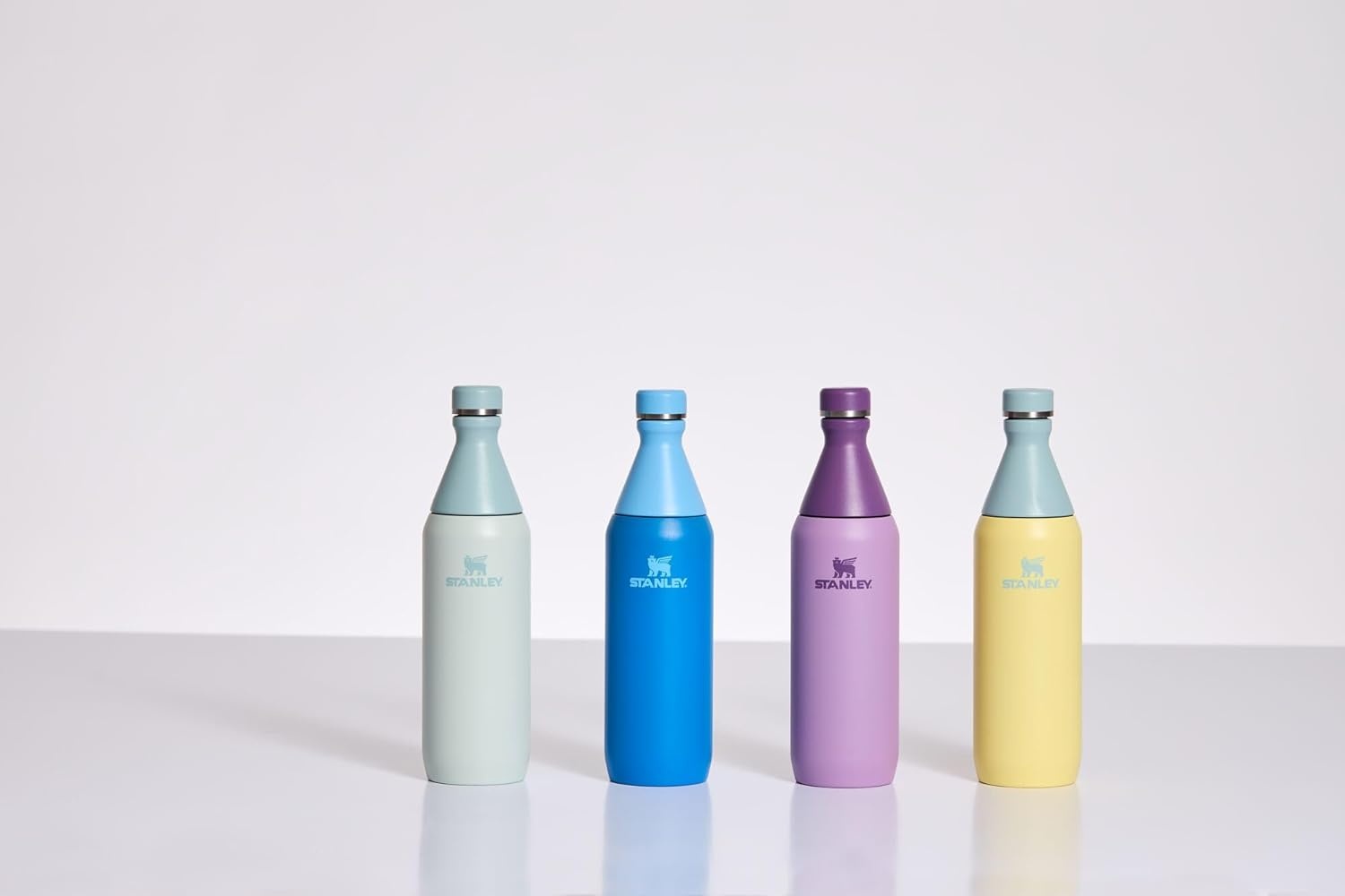image:imageStanley All Day Slim Bottle 20 oz Twist On Lid with Leakproof Seal Slim Design for Travel amp Gym Insulated Stainless Steel BPAFree Dawn DriftPomelo