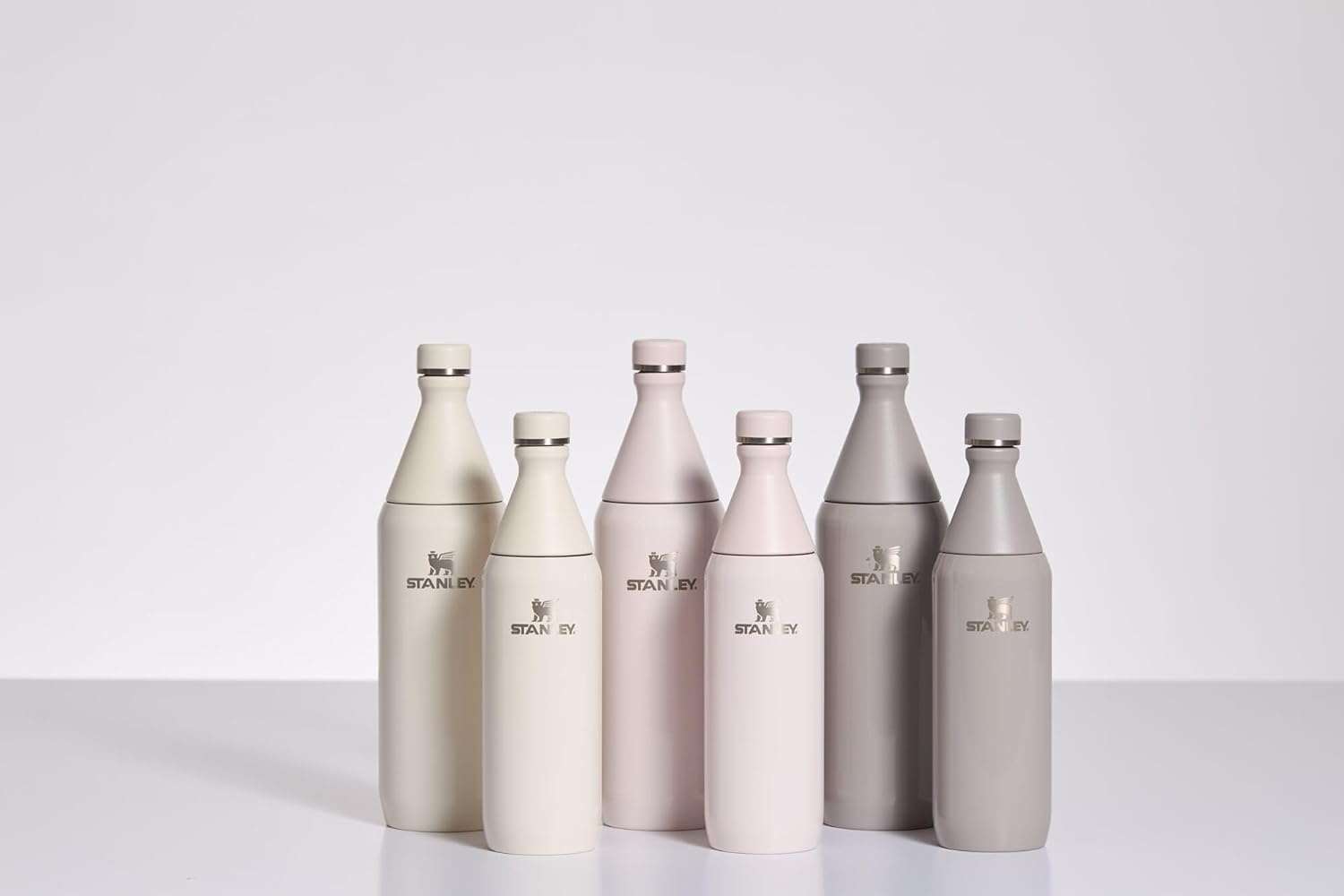 image:imageStanley All Day Slim Bottle 20 oz Twist On Lid with Leakproof Seal Slim Design for Travel amp Gym Insulated Stainless Steel BPAFree Dawn DriftRose Quartz