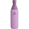 Stanley All Day Slim Bottle 20 oz | Twist On Lid with Leakproof Seal | Slim Design for Travel & Gym | Insulated Stainless Steel | BPA-Free | Dawn Drift(Lilac)